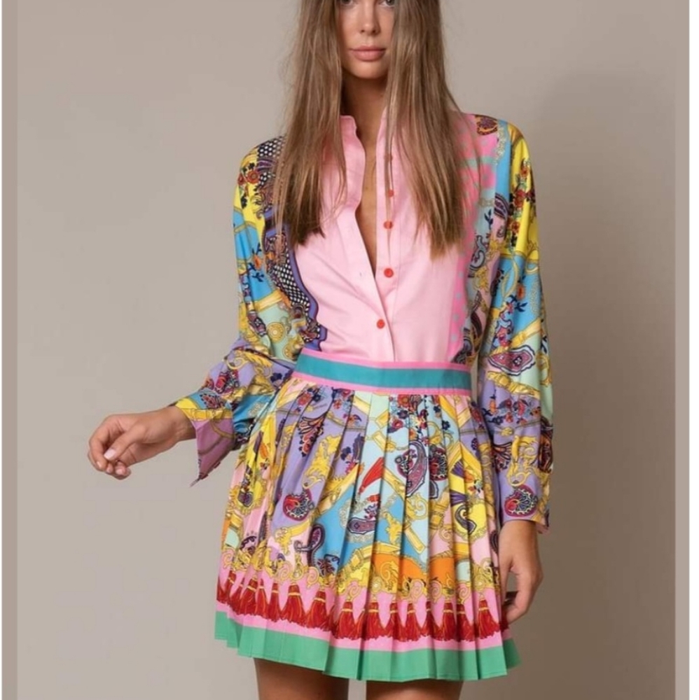 Size Medium skirt and shirt, but fits like Small.
